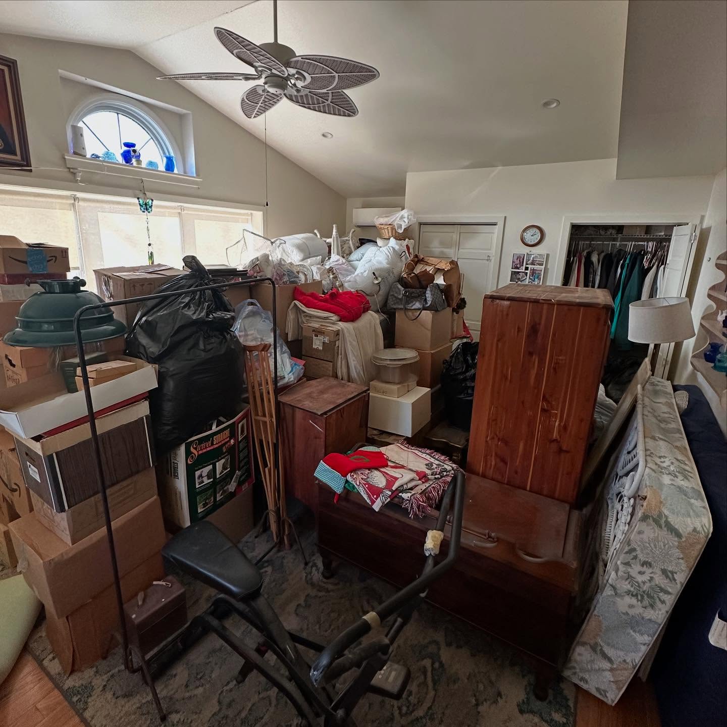 In-home furniture moving by Aron Movers in South Jersey: attic contents brought down to a living room for sorting